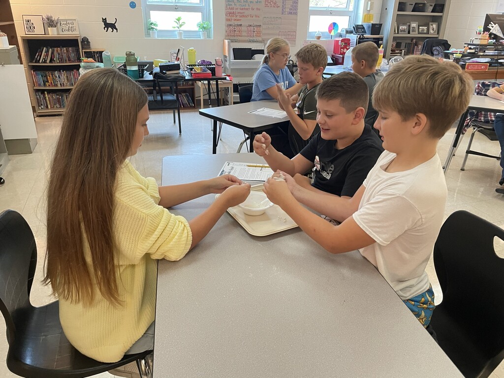 5th Grade Students exploring Goop to describe the states of matter.