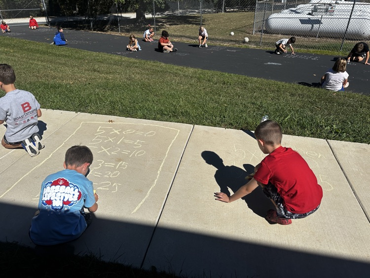 third grade doing multiplication facts outside 