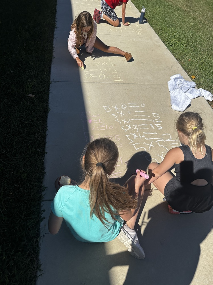 third grade doing multiplication facts outside 