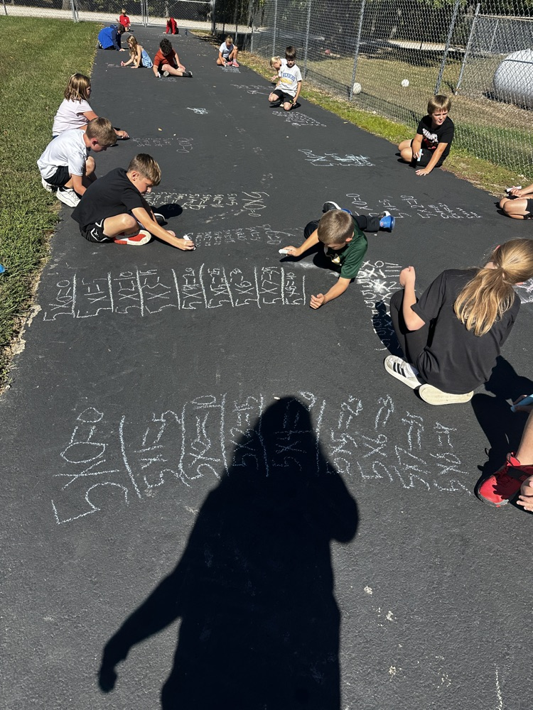 third grade doing multiplication facts outside 