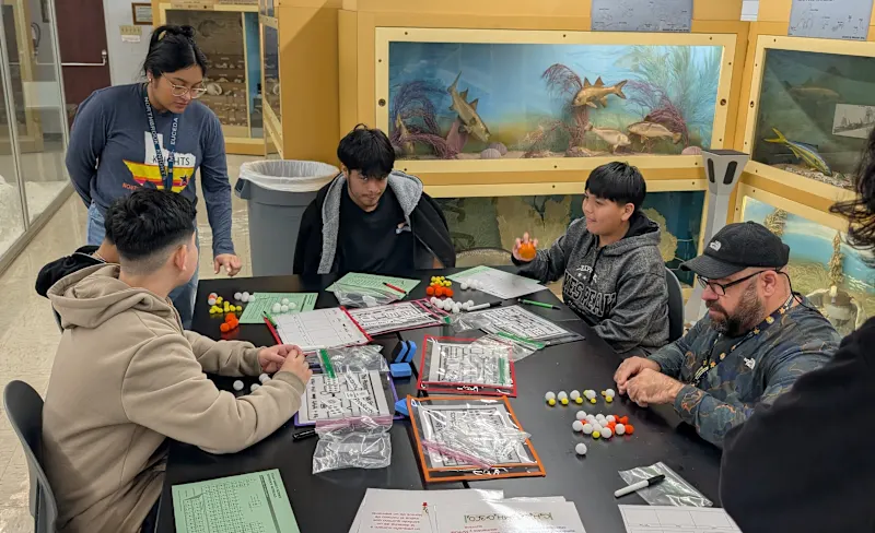 students modeling molecules