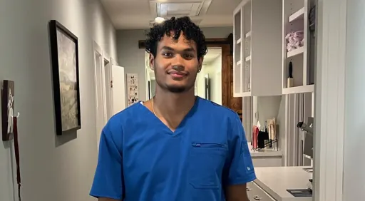 Gadiel Montero standing in medical scrubs