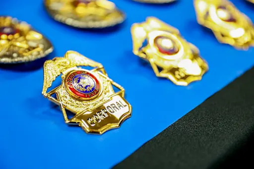 police badges laid out on a table