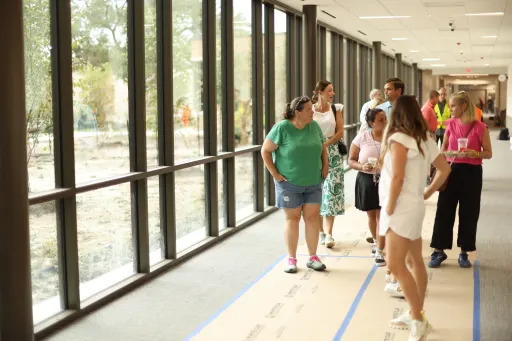 group of people checking out nearly-finished memorial drive elementary