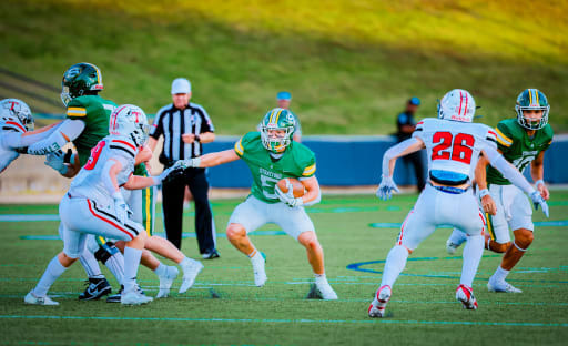 Stratford running back Javier Denson running with the football against Tomball