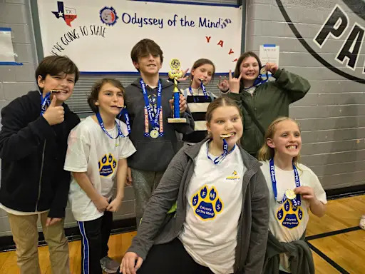 Spring Forest middle school odyssey of the mind team celebrating a win