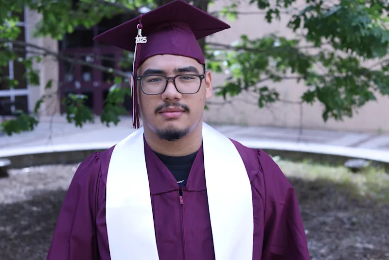Josue Giron in graduation attire