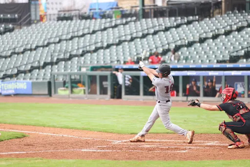 a batter swinging at a pitch