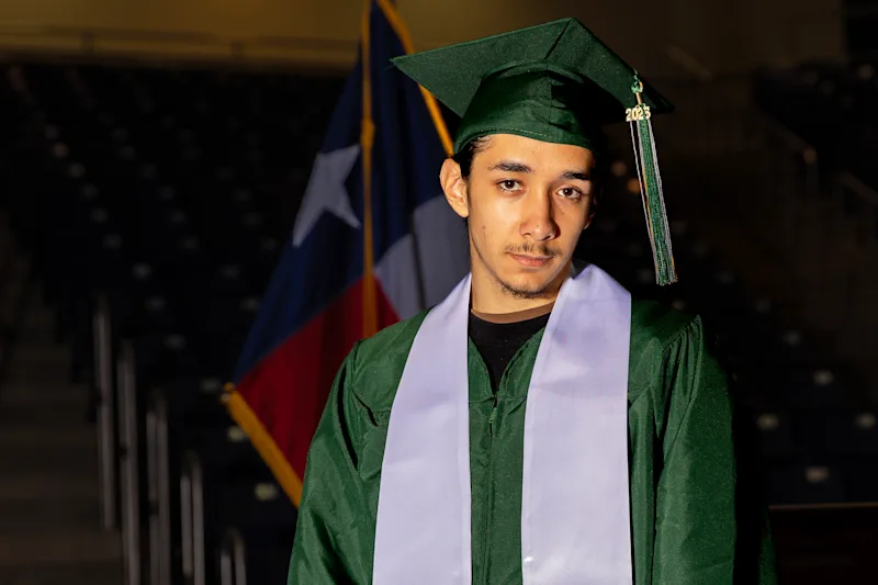 Ryne Rush in full graduation attire