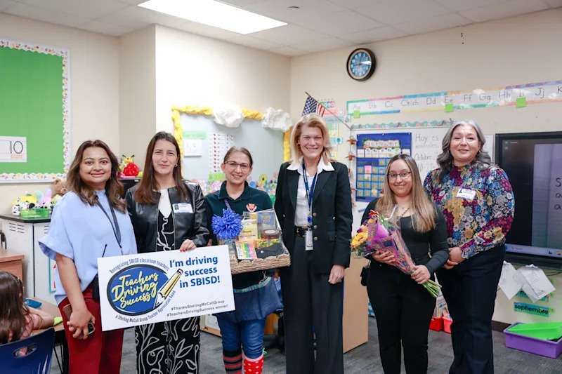 Maria Garza accepting SBISD I'm Driving Success award