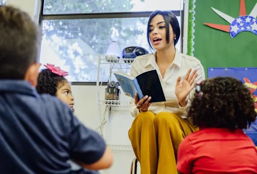 teacher reading to group of students