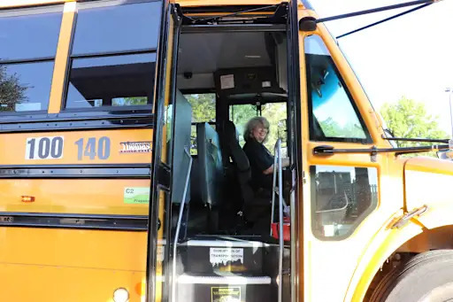 bus driver opening bus doors