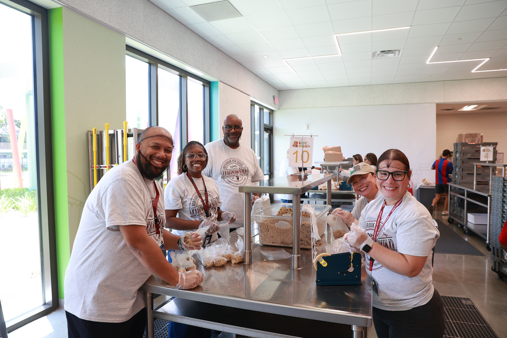 Staff working to fill kids meals