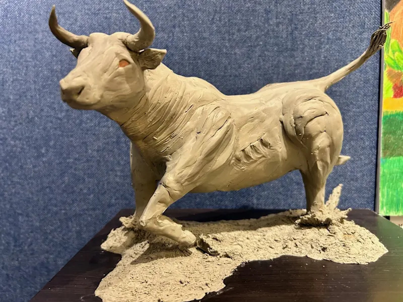 clay sculpture of a bull