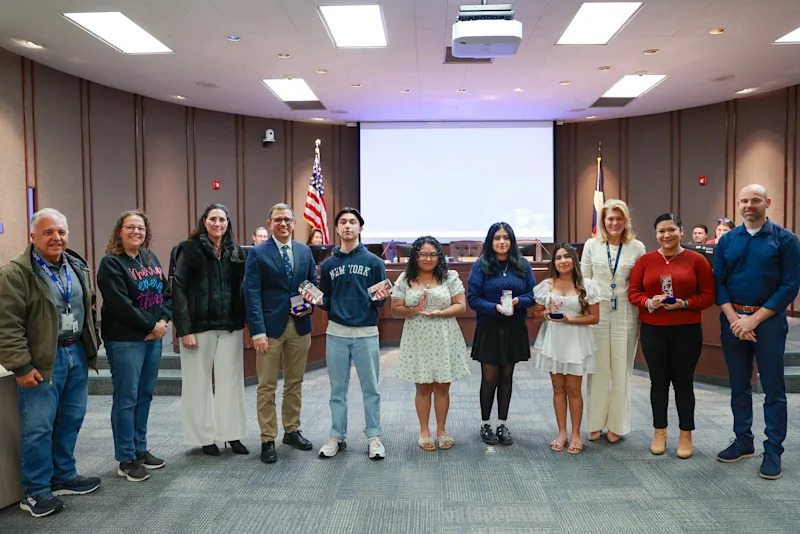 students and teachers accepting awards