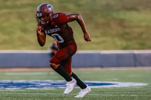Northbrook football player Maurice Campbell running down the field