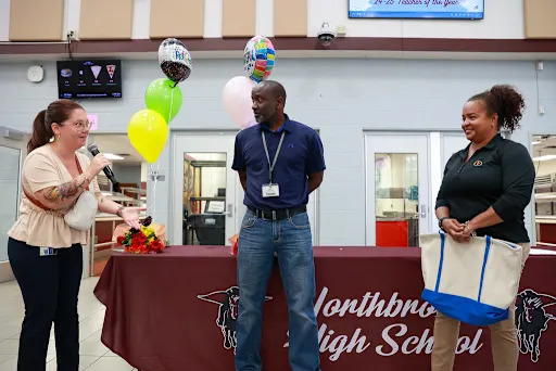 Jason Campbell receivign recognition as a teacher of the year finalist