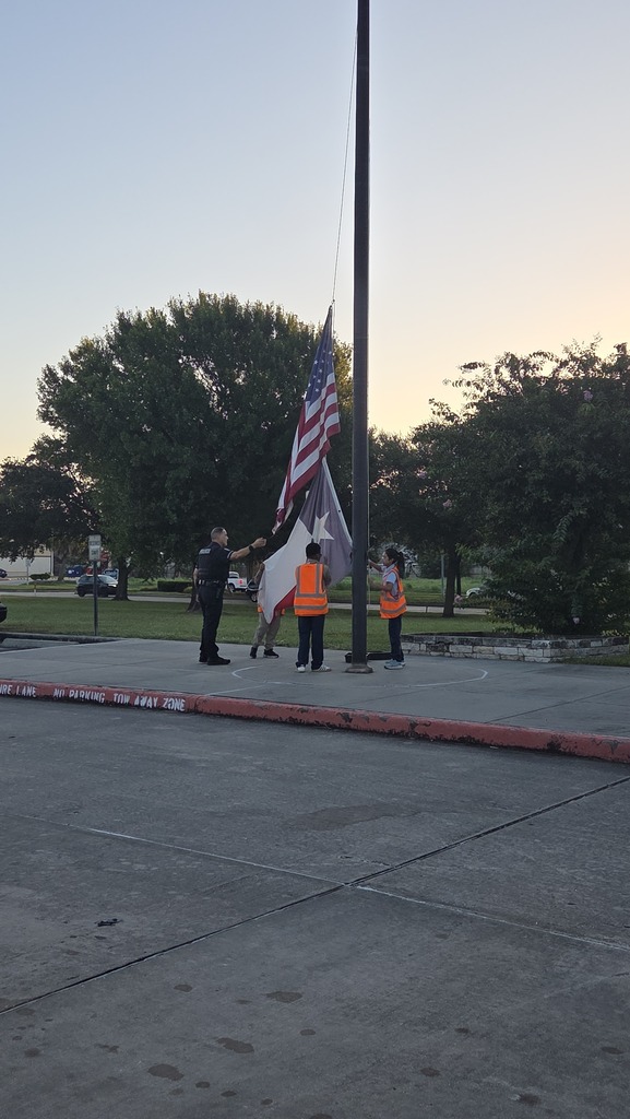 BCE flag crew raising the flags.