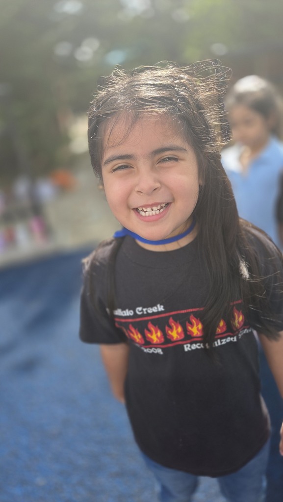 Kindergarten girl wearing a vintage BCE shirt.