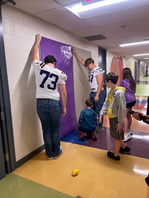 Bronco Buddies helping out.