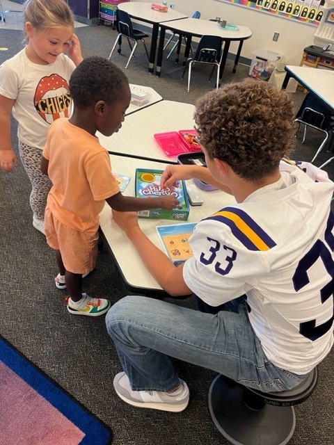 Bronco Buddies helping out.