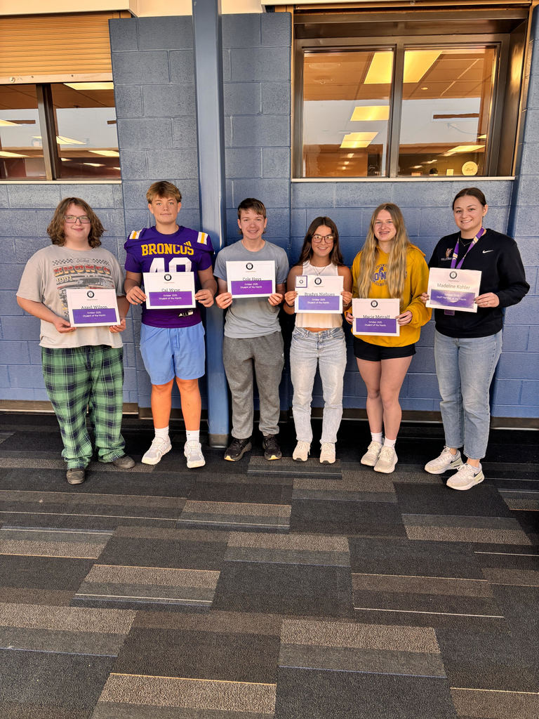 Posed photo of winners with certificates