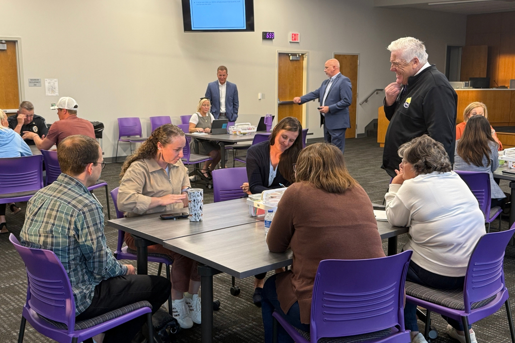 Small group conversations during the School Safety event on 10/7