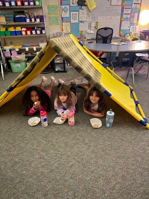 students in tent