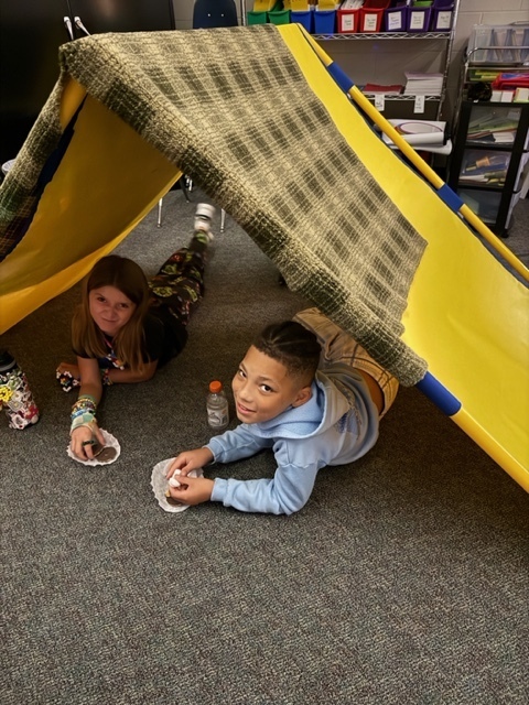students in tent