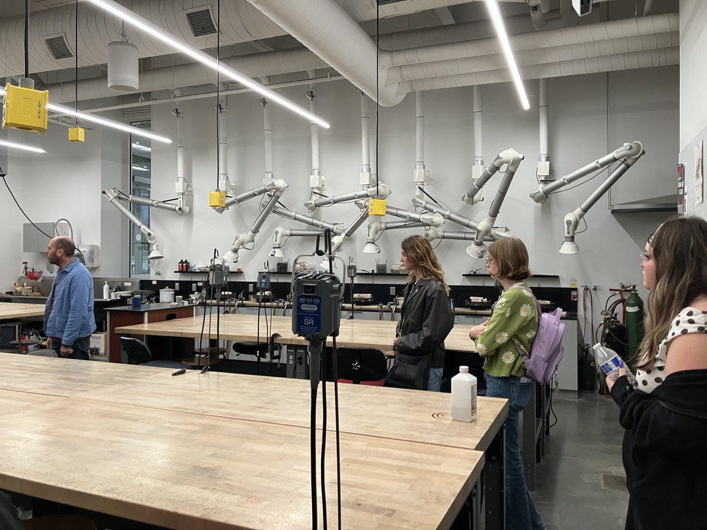 Students observing a tour