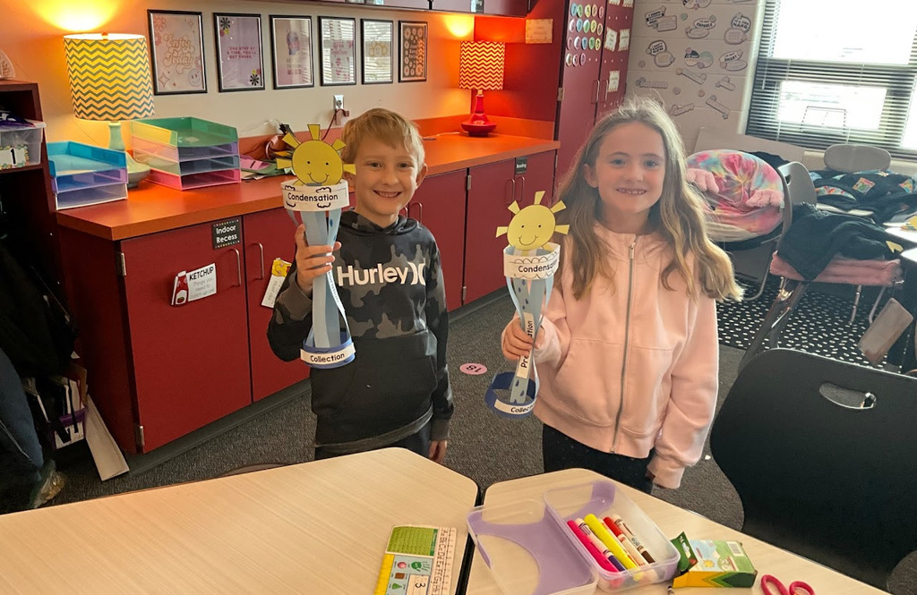 posing with butterfly life cycle 