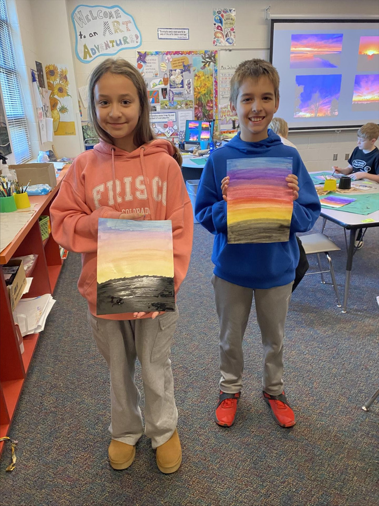 posing with art work