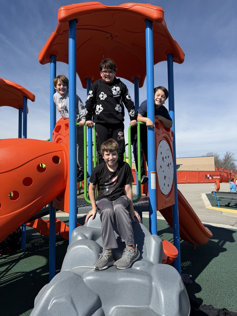 Fourth graders playing on the playground
