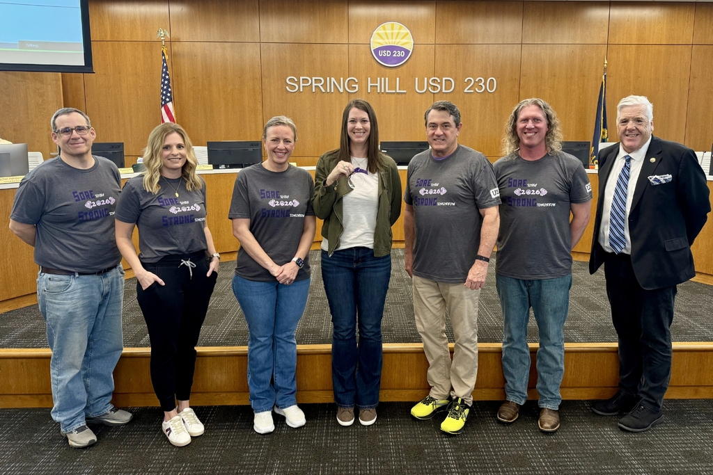 Teresa Satchell posing alongside Superintendent Luttrell and Board of Education members Chitwood, Baker, Horne, Hull, and Beauchamp