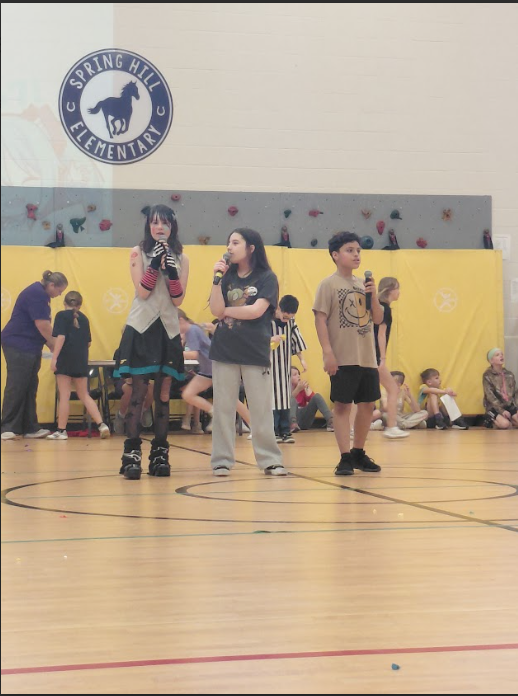 Students singing during March Madness