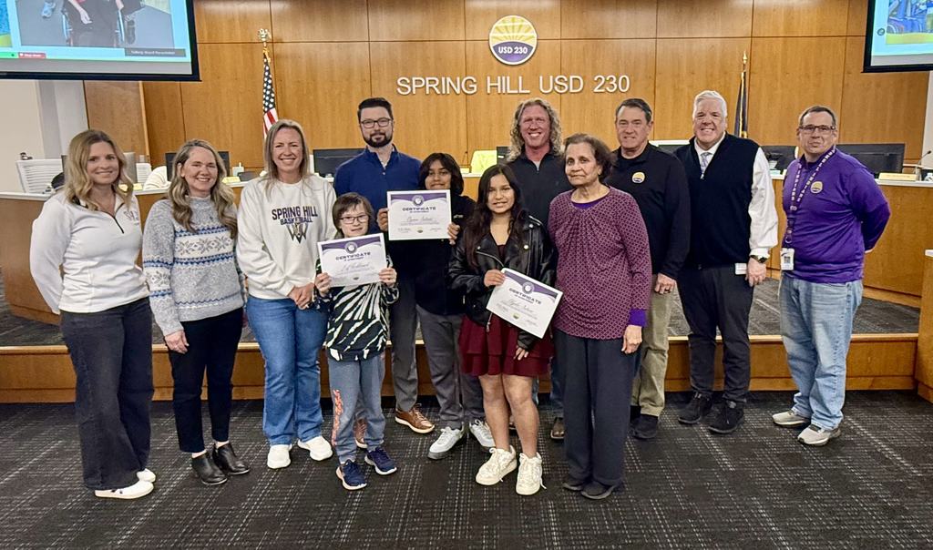 BOE members, alongside Mrs. Sly and Dr. Luttrell, posing with FSMS student participants of MathCounts team