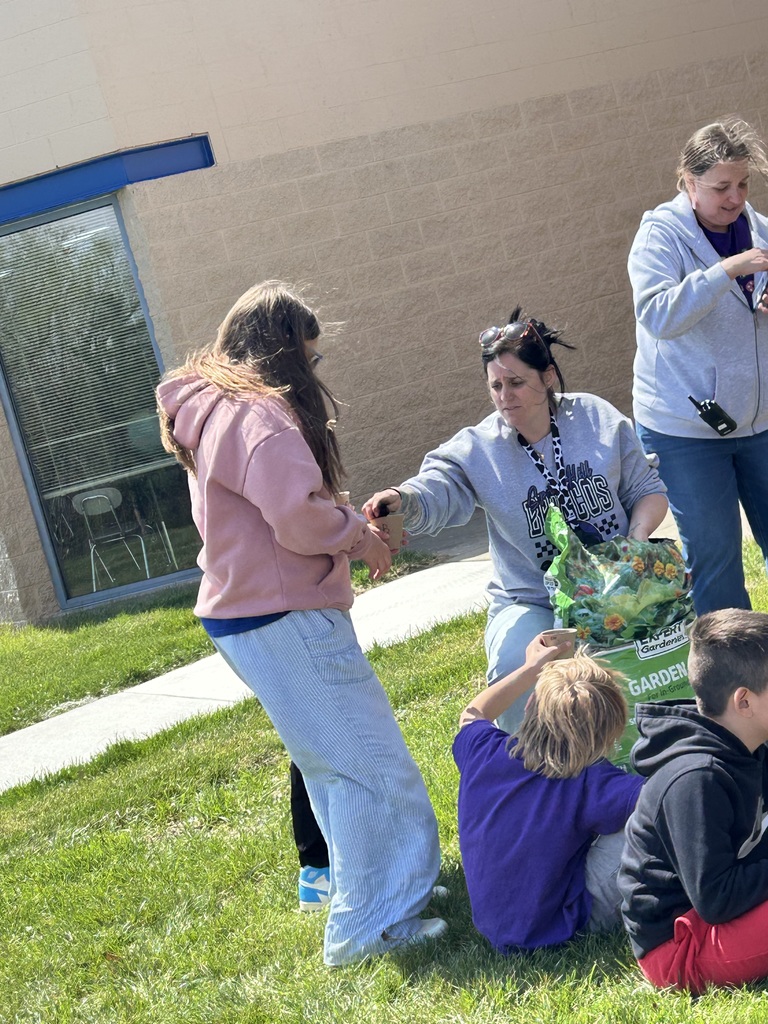 Third Grade planting flowers