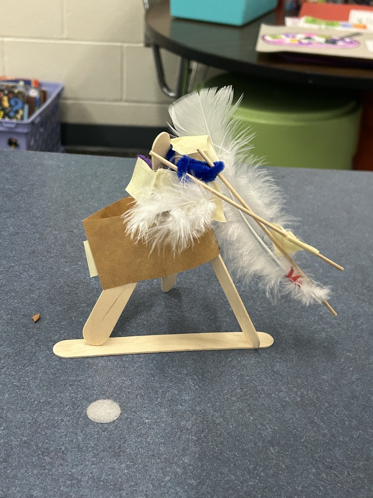 Student created house made out of a popsicle sticks.