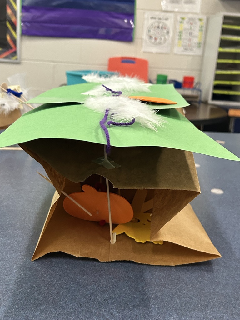 Student created house made out of a paper bag.