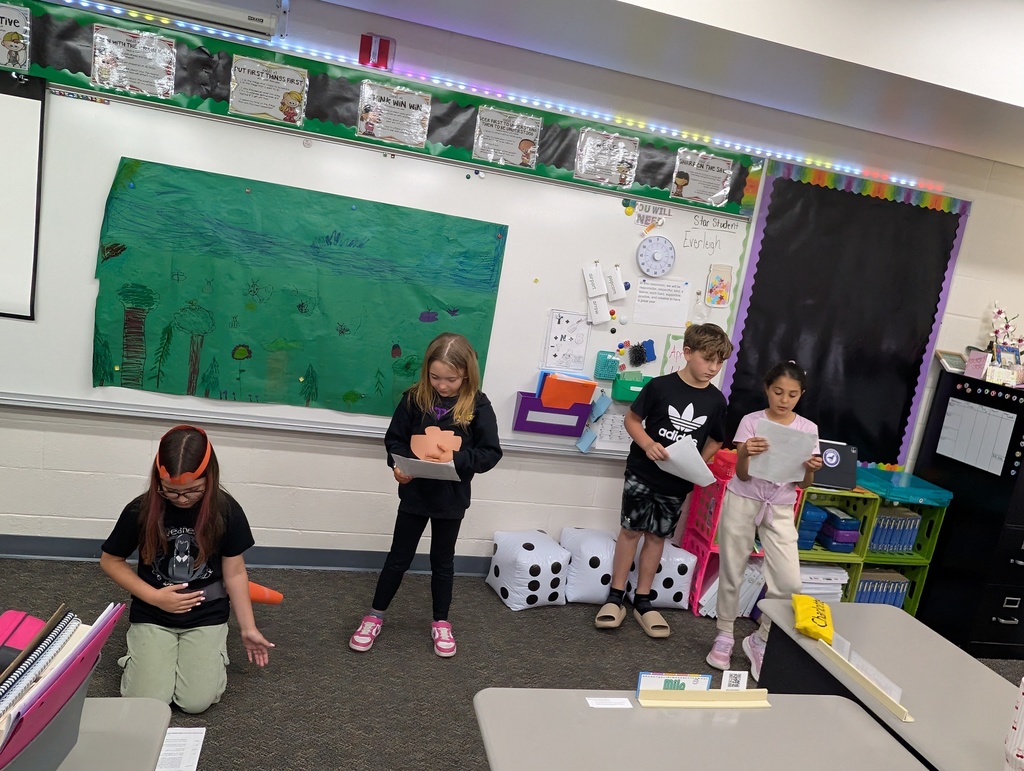 Students presenting Reader's Theater.