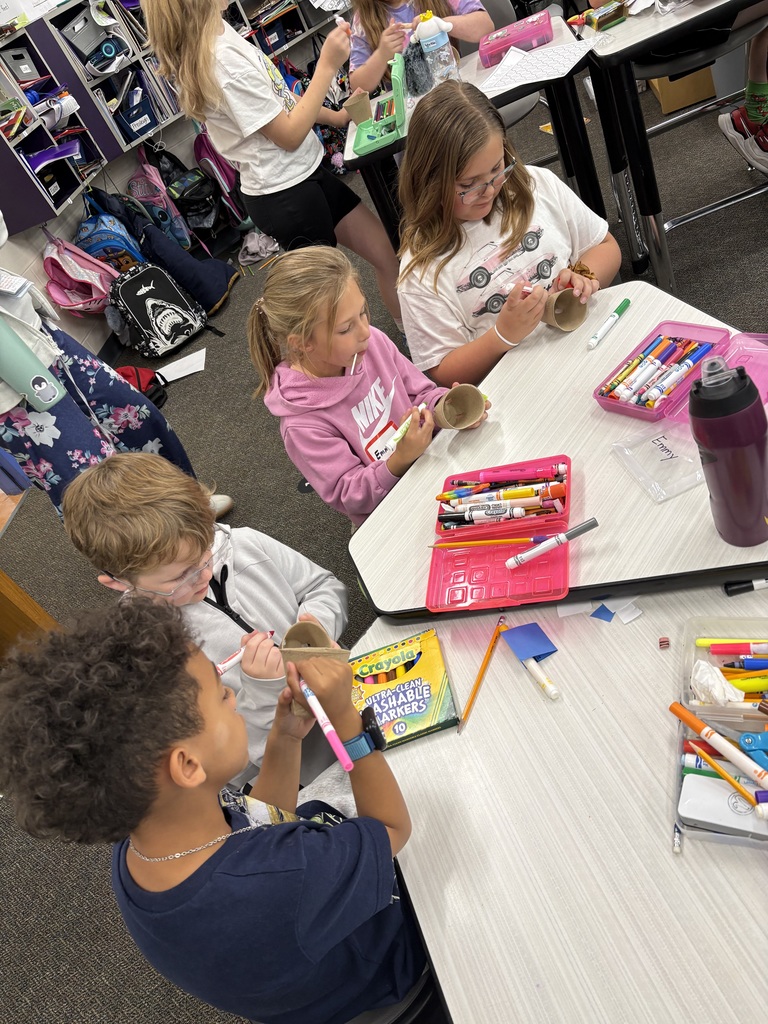 Fourth graders decorated flower pot with their first grade buddies last week.