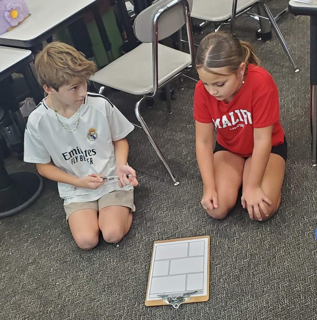 fifth graders working together