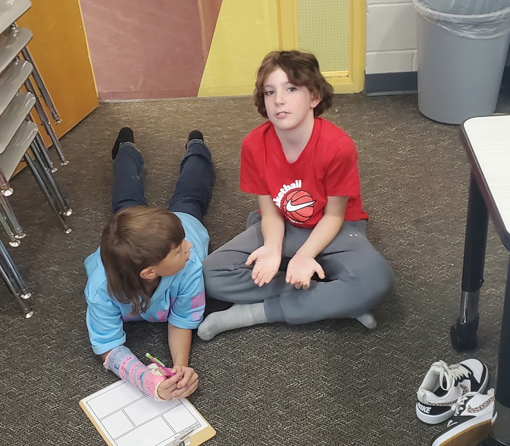 fifth graders working together