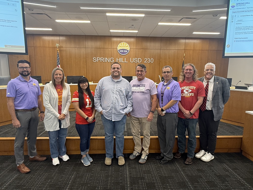 BOE Members, Alec Hitchens, Superintendent Luttrell posing in the board room