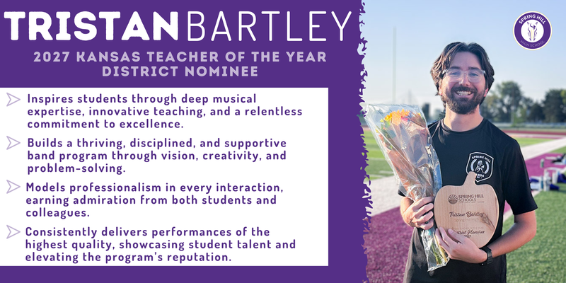 Tristan Bartley pictured with an apple shaped wood plaque commemorating his teacher of the year recognition