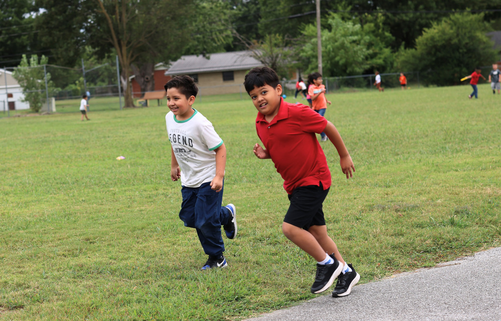 It's more than just a break from class—it's where friendships begin! Our first and second graders at Elmdale Elementary are having a blast, laughing and playing together during recess. What's your favorite recess memory? #SpringdaleFamily