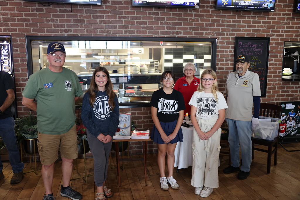 A powerful and meaningful message from some incredible students!  Aubrey, Avery, and Kaylee from John Tyson Elementary School of Innovation shared their moving activity book, "America's White Table," with members of the VFW Post 2952 Auxiliary today.  They honored the men and women of our armed forces who are missing in action or held as prisoners of war as part of POW/MIA Remembrance Day. The "white table" is a powerful symbol of their sacrifice.  It's inspiring to see these young students learning about and honoring such an important part of our nation's history. Thank you, Aubrey, Avery, and Kaylee, for sharing your project!  #POWMIA #RemembranceDay