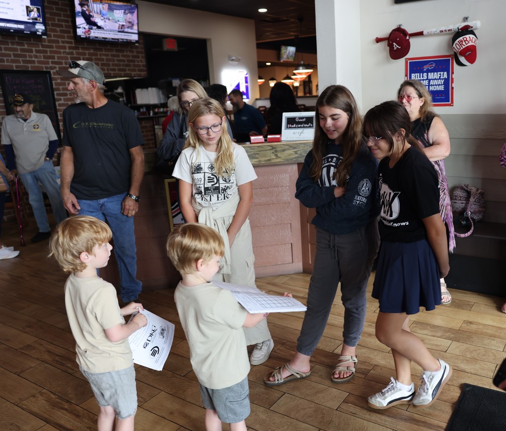 Inspired by the students from John Tyson Elementary! Aubrey, Avery, and Kaylee shared their activity book "America's White Table" with VFW Post 2952 Auxiliary, honoring POWs and MIAs on Remembrance Day. A powerful lesson in patriotism and remembrance. #POWMIA #WhiteTable