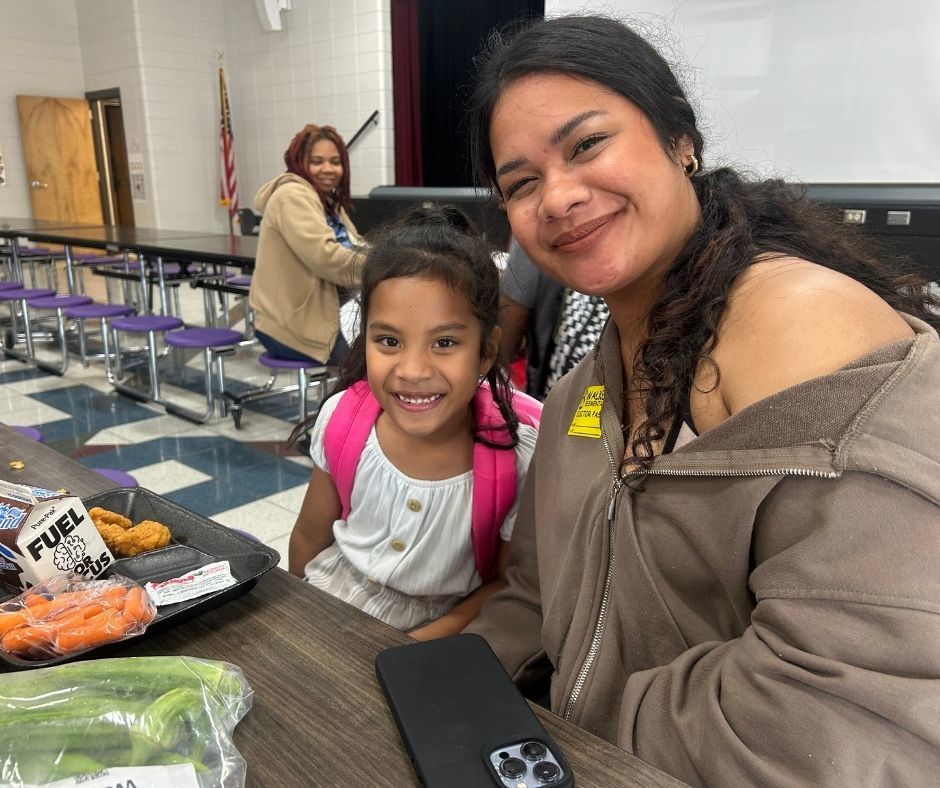 Walker families having dinner with their kids with the ROAR program