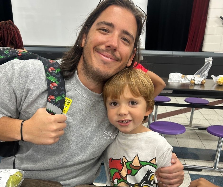 Walker families having dinner with their kids with the ROAR program